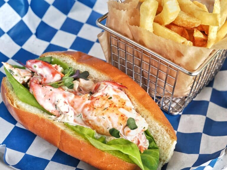 New England Lobster Roll at The Nauti Lobstah with chilled Maine Lobster meat tossed in house mayonnaise dressing.