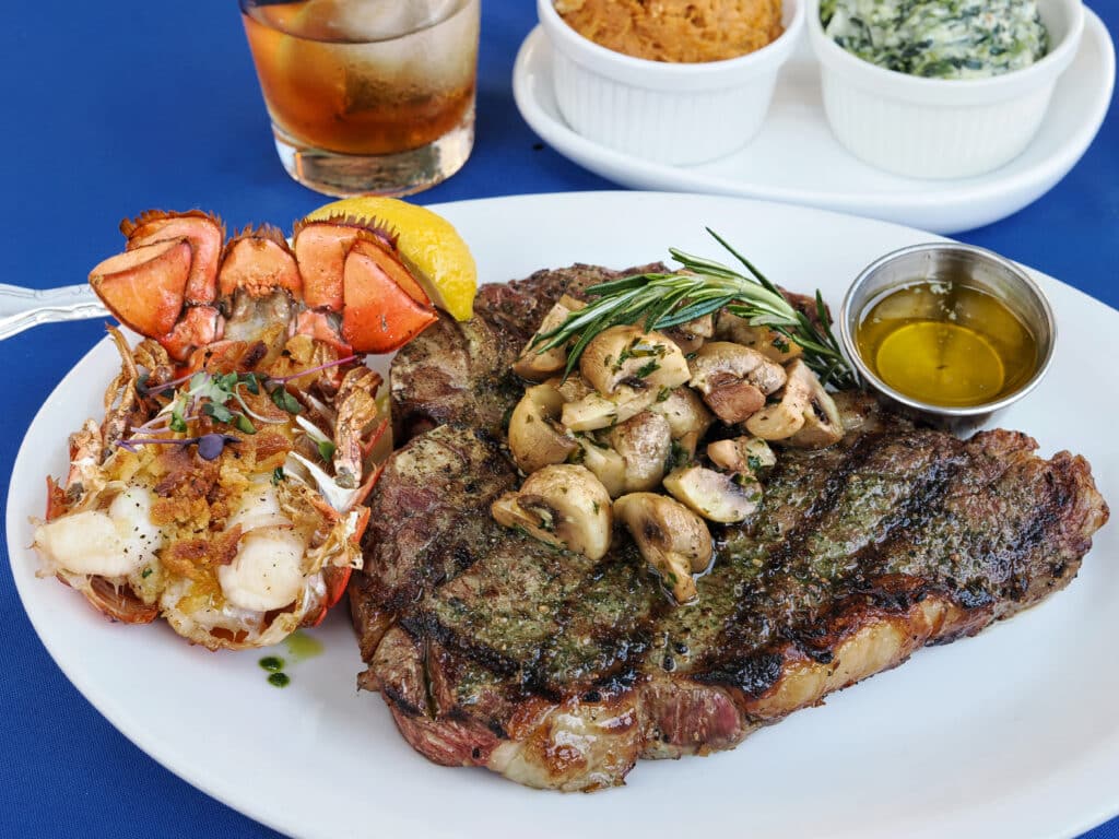 The Steakhouse Experience at The Nauti Lobstah includes Surf & Turf Creekstone Black Angus Porterhouse steak and Maine Lobster