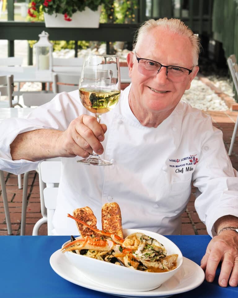Chef Mike Rumplik with his Cioppino seafood stew at The Nauti Lobstah named best seafood restaurant in Orlando