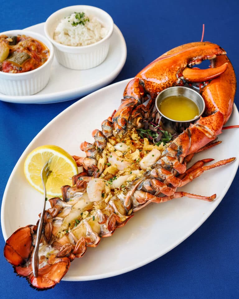 Fisherman's style Maine Lobster featured in Visit Orlando Cookbook from The Nauti Lobstah best seafood restaurant in Orlando